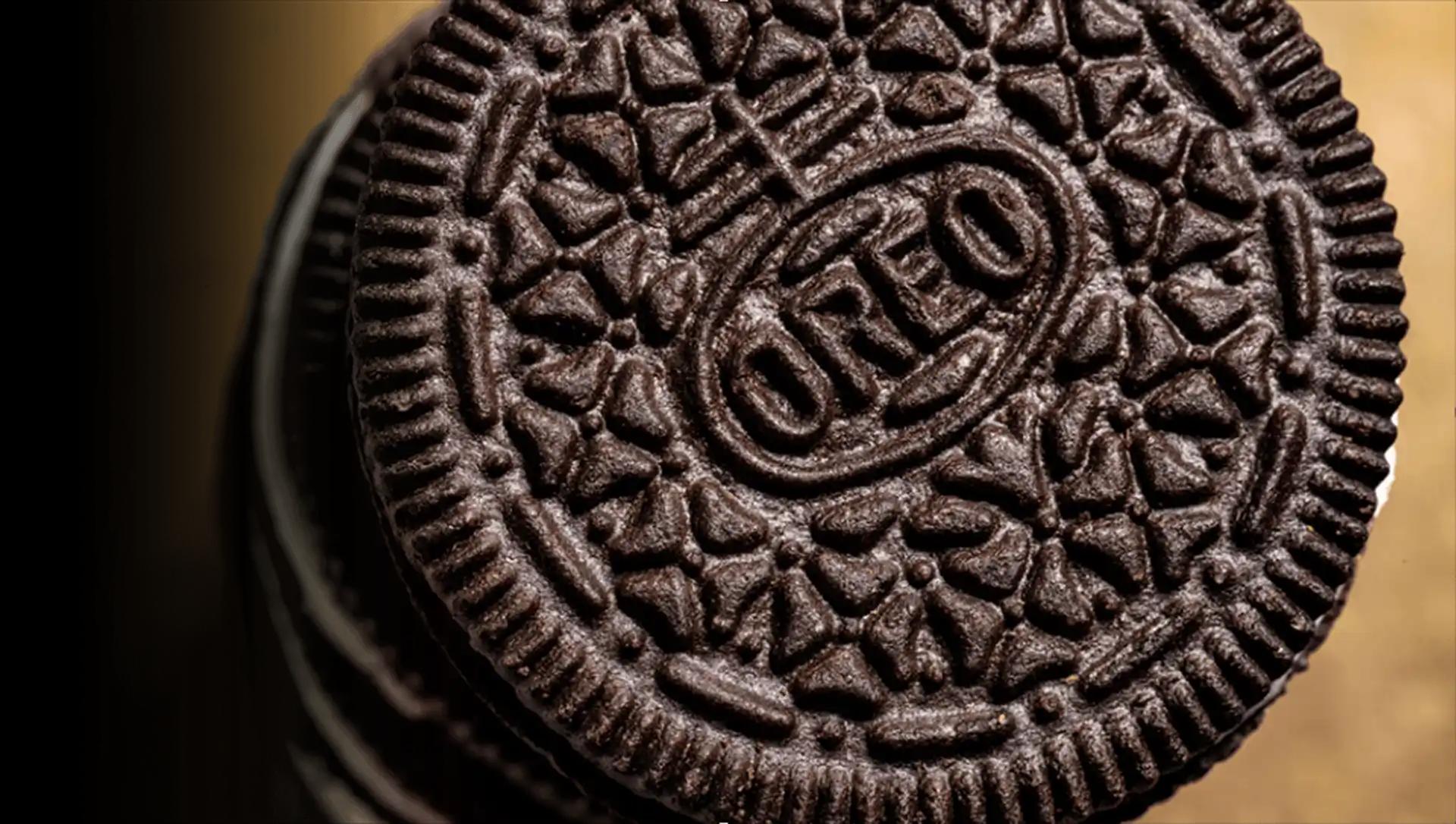 Close-up of Oreo cookie on table with logo showing.
