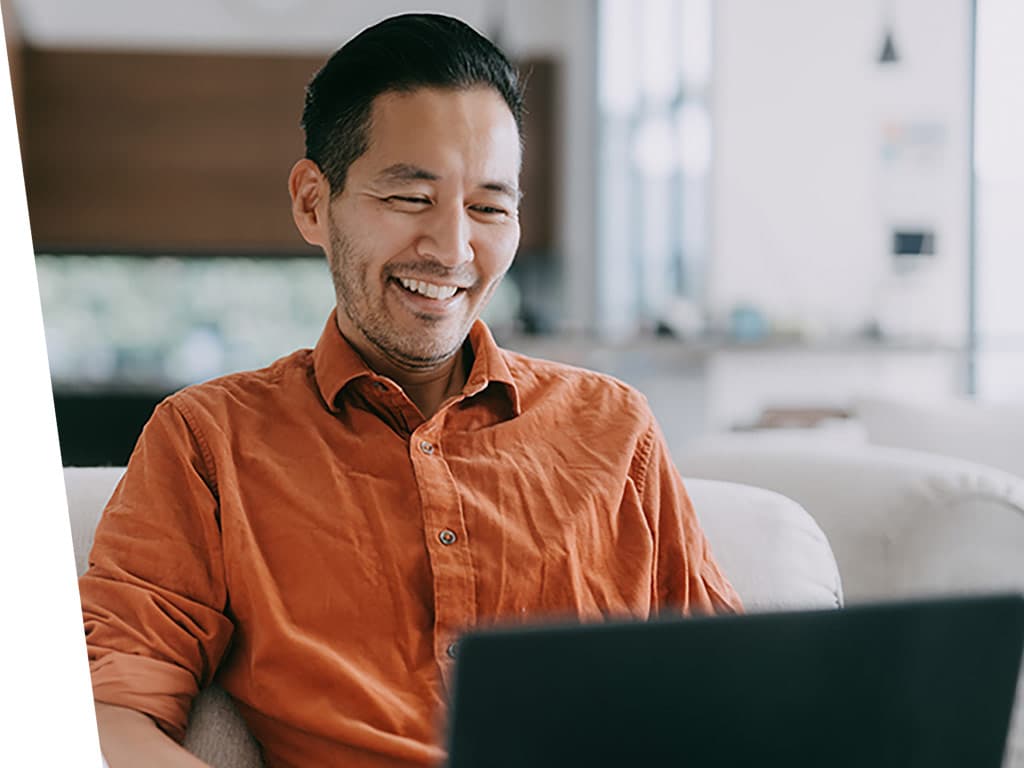 A man working from home on his laptop.